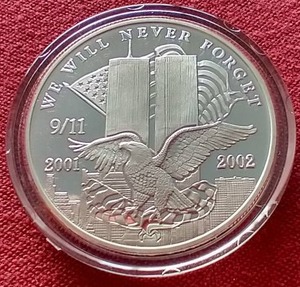 lot 33 image: 20012002 9-11 We Will Never Forget 1 oz Silver Medal