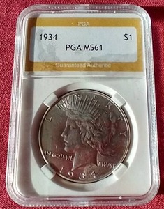 lot 47 image: 1934 Peace Dollar - PGA MS61