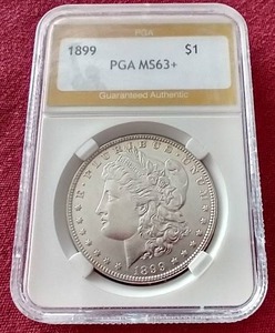 lot 134 image: 1899 Morgan Dollar PGA MS63 - RARE Date