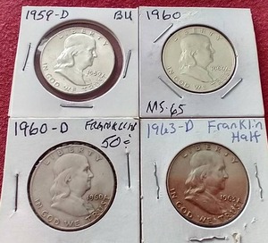 lot 145 image: (4) Franklin Half Dollars