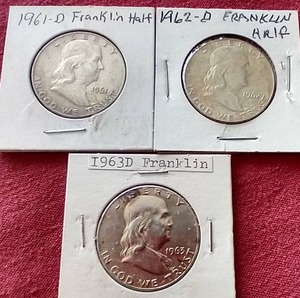 lot 202 image: (3) Franklin Half Dollars