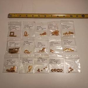 lot 431 image: Lot of brass and antique brass colored findings