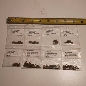 lot 434 image: Eight packages total, Brass and Brass plated beads