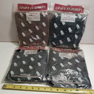 lot 439 image: Lot of four packages craft feathers, All purpose fluffs, decorate and craft, florals, wreaths, fans, brooms, dolls, birds, animal novelties.