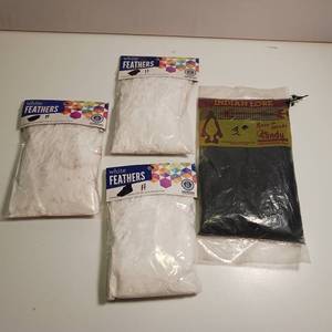 lot 440 image: Lot of four packages craft all purpose fluffs, decorative and craft feathers.