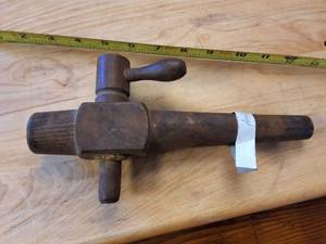 lot 489 image: This is an antique wooden barrel spigot or tap.�