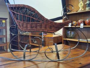 lot 491 image: Vintage wicker and wrought iron decorative sleigh, often used as Christmas or holiday home decor