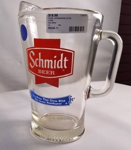 lot 116 image: Vintage Schmidt beer pitcher featuring classic breweriana branding.