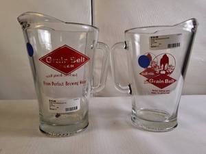lot 117 image: Lot of 2 Vintage Grain Belt Beer pitchers, classified as collectible barware