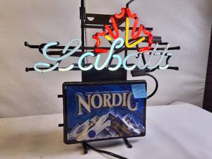 lot 122 image: Vintage Labatt Blue beer neon sign featuring a maple leaf and a Nordic graphic - works