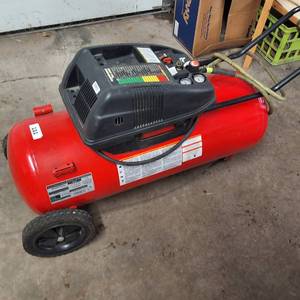 lot 131 image: Husky Verti-Zontal 26-gallon air compressor with the model number WL650702AJ.