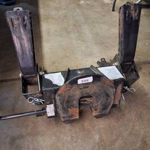 lot 144 image: 5th wheel trailer hitch designed for towing large trailers or campers.