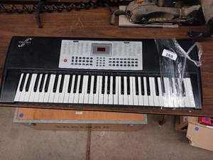 lot 168 image: First Act electronic keyboard.