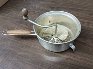 lot 172 image: Vintage Foley food mill, commonly used for mashing and straining foods like applesauce or tomatoes