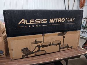 lot 174 image: Alesis Nitro Max 8-Piece Electronic Drum Set.