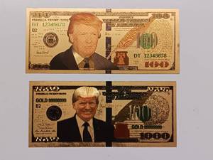 lot 483 image: Commemorative Donald Trump - 24K gold foil - $100 & $1000 Novelty - Collectible Trump Bucks or Gold Trump Notes.
