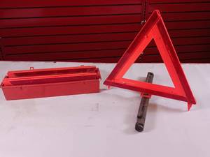 lot 229 image: Emergency warning triangle kit used to alert other drivers to a roadside hazard or disabled vehicle.