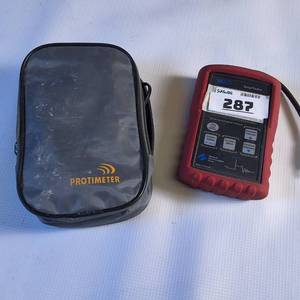 lot 287 image: Protimeter instrument, specifically a moisture meter with a handy protective carrying case