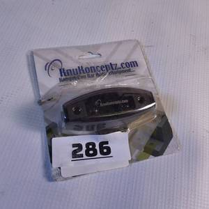 lot 286 image: KnuKonceptz brand car audio accessory, specifically a surface-mounted component for wiring or lighting.