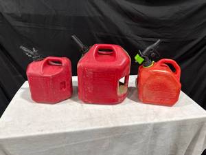 lot 1776 image: Three Red Plastic Gas Cans