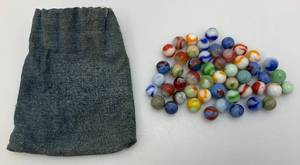 lot 25 image: Very Old Marbles In Marble Pouch