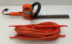 lot 118 image: Vintage Black And Decker Hadge Trimmer With Extension Cord
