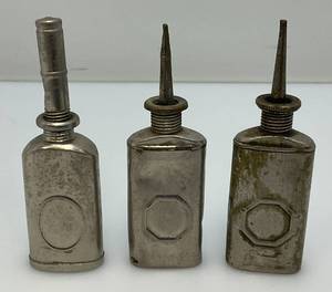 lot 142 image: Thre Very Old Miniature Metal Oil Cans 3 12 Tall