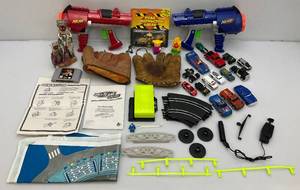 lot 191 image: Misc. Vintage Toys Including ERTL Die-Cast Ford Tractor Loader Backhoe (NEW), Slot Car Track With Cars (Missing Some Track) And More
