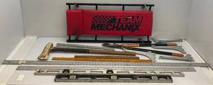 lot 236 image: Misc. Garage Items Including Long Aluminum Levels, Long Aluminum Straight Edge Rulers And More