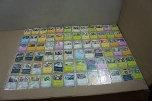 lot 178 image: 8 Sheets of Pokemon Cards