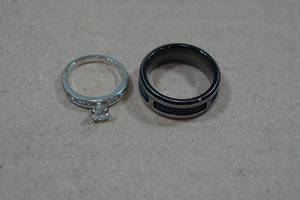 lot 226 image: Stainless Steel Mens Wedding Band and Plated Womens Ring