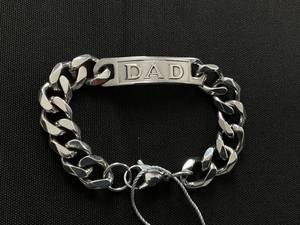 lot 62 image: STEELTIME Mens Stainless Steel Cuban Link Chain Bracelet with Engraved Dad Approx. circumference- 8