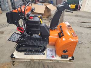 lot 10 image: 34 Stand-On Gas-Powered Snow Blower, Dual Stage, Rubber Track, LED Light, 50�� Throwing Distance