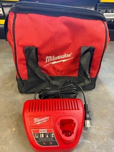 lot 19 image: M12 Charger & Milwaukee Bag Brand new items