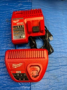 lot 86 image: M12 Charger and M12M18 Milwaukee Charger Brand New