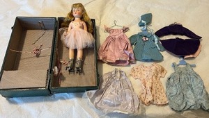 lot 33 image: Vintage Shirley Temple Doll with Trunk, Multiple Outfits and Accessories