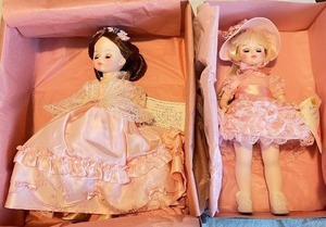 lot 43 image: Madame Alexander Abigail Fillmore and Renoir Collector Dolls in Pink Dresses