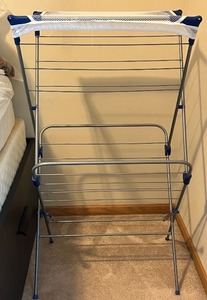 lot 16 image: Folding Metal Laundry Drying Rack with Mesh Shelf