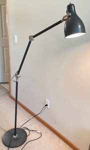 lot 47 image: Adjustable Black Metal Floor Lamp with Articulating Arm, 59 Inches Tall