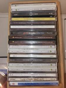lot 152 image: Collection of 25 Music CDs including The Beatles, Garth Brooks, Weird Al, and Others with Wooden CD Crate