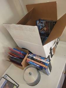 lot 153 image: Collection of DVDs and Blu-rays including Finding Dory, Happy Feet, and Mystery Series