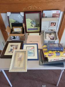 lot 169 image: Large Collection of Photo Frames, Albums, Display Cases, and Wall Racks