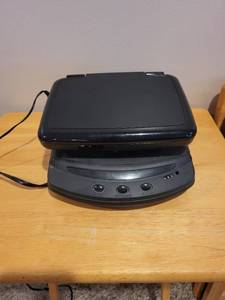 lot 280 image: RCA Portable DVD Player and Solidex Video Cassette Rewinder Model 7000XT