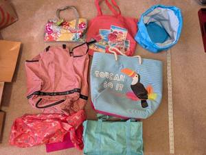 lot 77 image: Collection of 7 Tote and Beach Bags featuring Zuca and Thirty-One