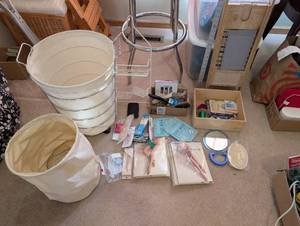 lot 79 image: Collection of Laundry Hampers, Foot Masks, Essential Oils, and Personal Care Items