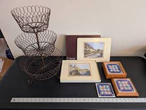 lot 218 image: Decorative 3-Tier Metal Basket Stand with Framed Art Prints and Tile Coasters Set
