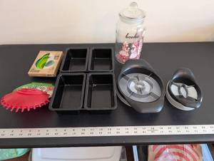 lot 227 image: Kitchen Gadget Collection with Mini Loaf Pans, Cookie Jar, Avocado Huggers, and Slicers