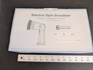 lot 249 image: Electric Spin Scrubber Cleaning Kit with 6 Replacement Brush Heads and Accessories