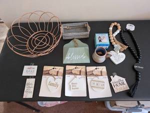 lot 252 image: Home Decor Lot with Wire Basket, Signs, and Beaded Garlands