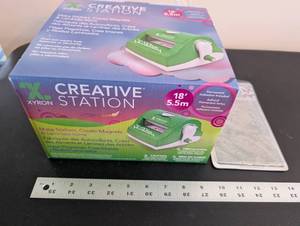 lot 260 image: Xyron Creative Station With 18ft Cartridge and Elizabeth Craft Designs Embossing Folder
